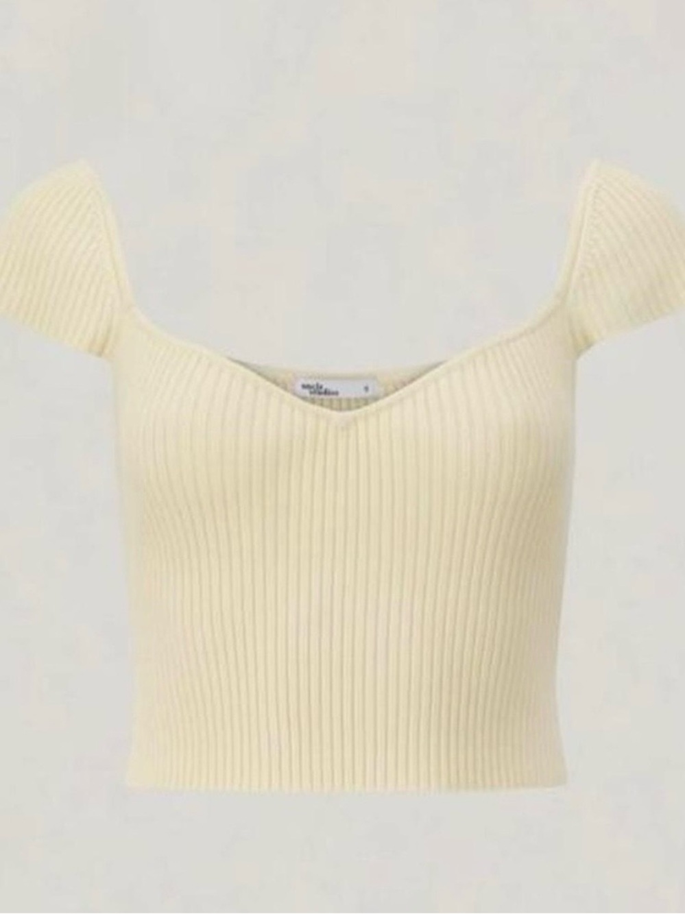 Uncle Studios Cream Ribbed V-Neck Short Sleeve Knit Top